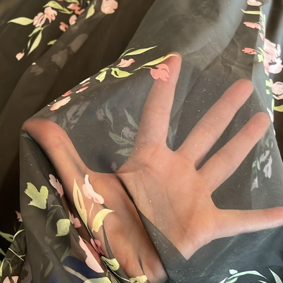 Jenny Yoo Cassie
Flutter Sleeve
Surplice Gown
Black with Floral Pattern. - Picture 7 of 17